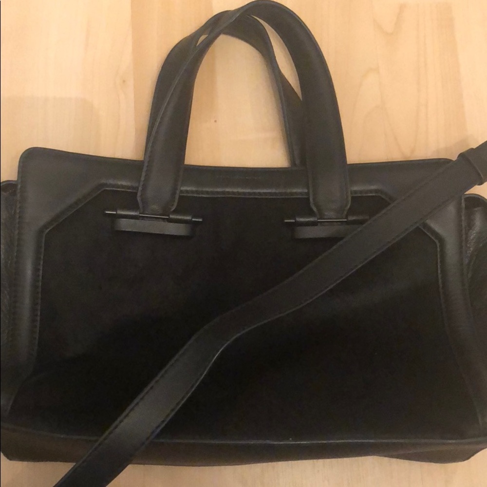 Black leather and calf hair POUR LA VICTOIRE